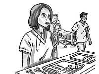 Eine Frau sitzt an einem Tisch mit medizinischen Instrumenten vor sich.